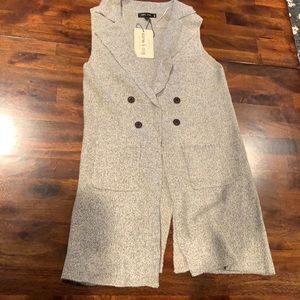 Sleeveless sweater duster